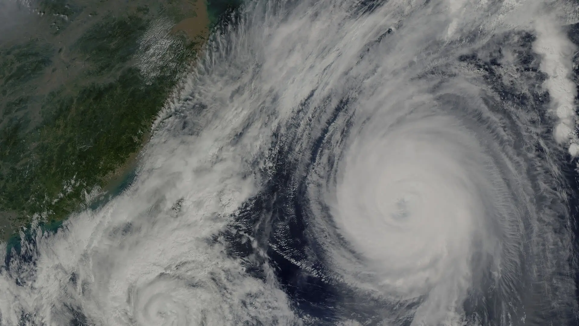 Satellite view of a large hurricane spiral, illustrating the atmospheric dynamics used in forecast generation.