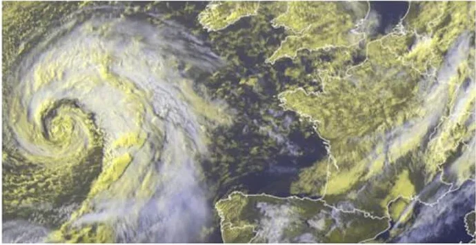 Satellite visualization of a deep low-pressure system (973 hPa) with a distinct spiral structure approaching the French Channel coast.